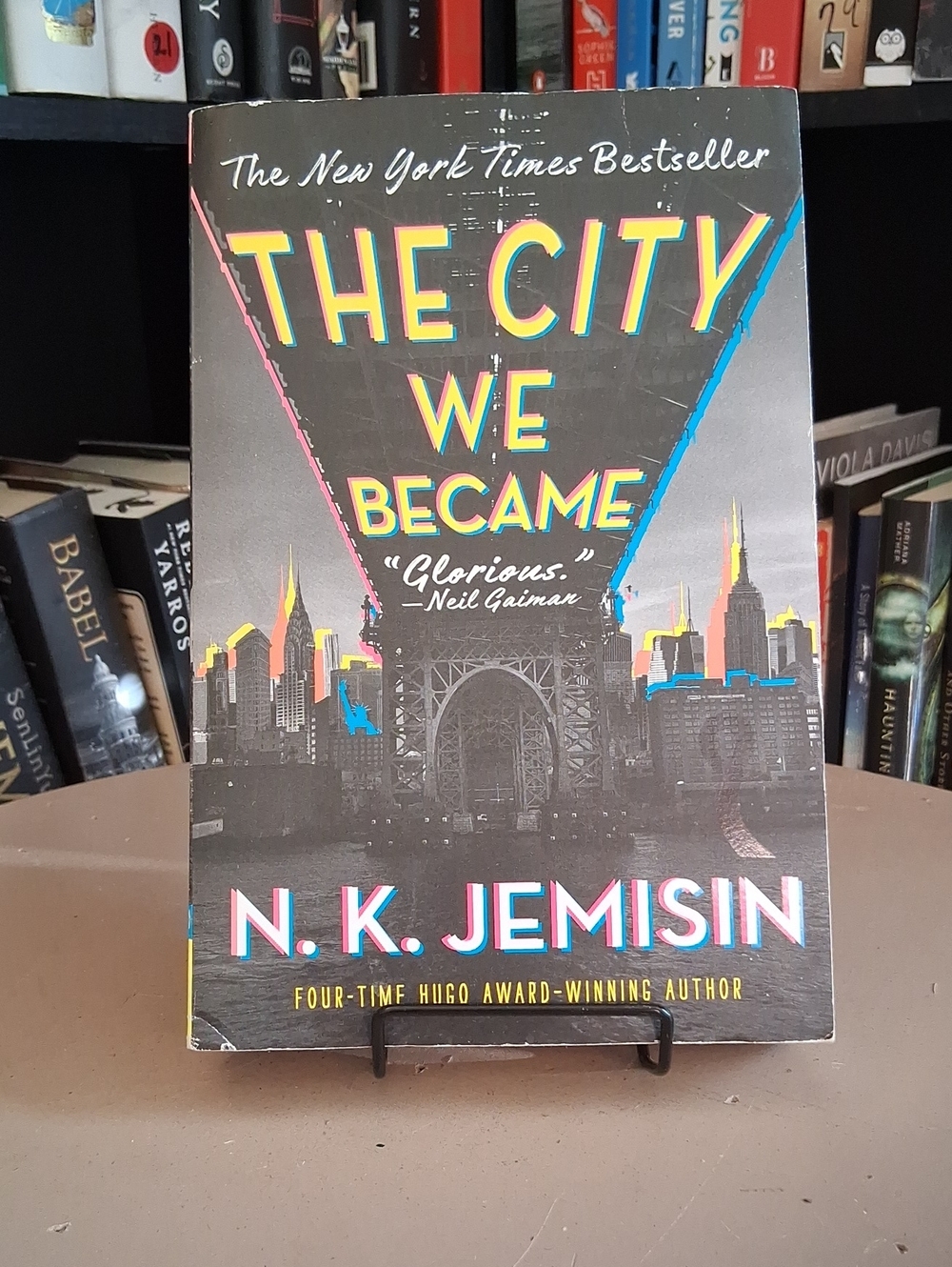 Paperbacks - Black Cover with Yellow, Blue, Pink and Gold Accents